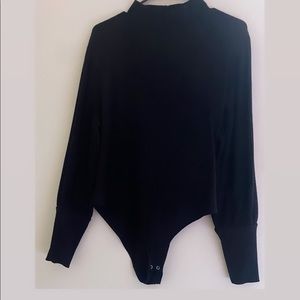 Black body suit turtleneck